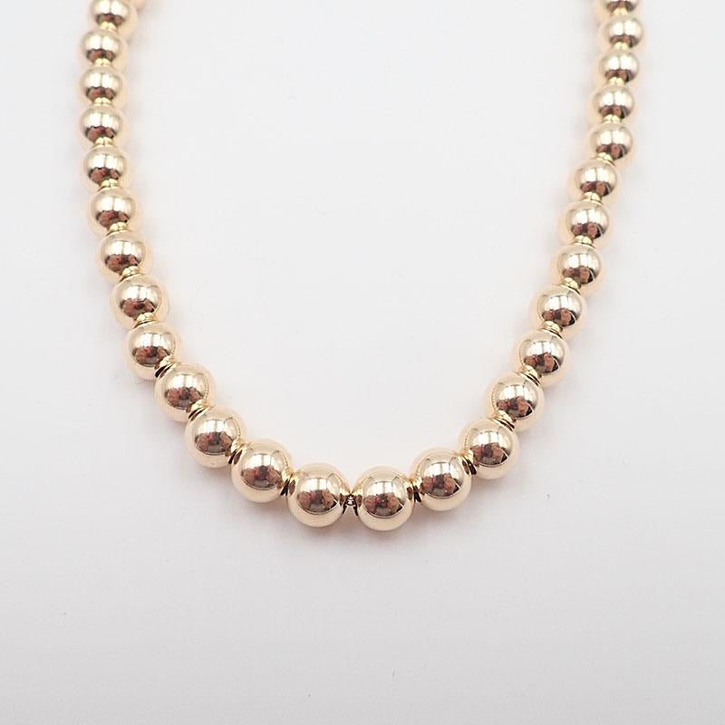 Gold ball necklace
